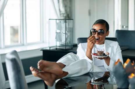 model eating fruit and nuts in suite -1600px