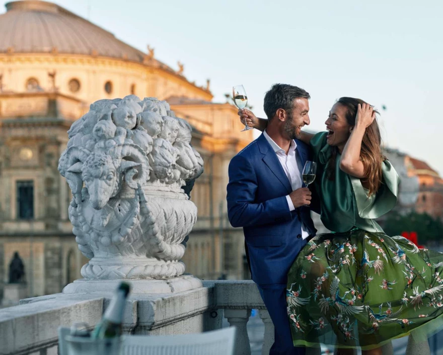 model couple laughing on balcony -1600px